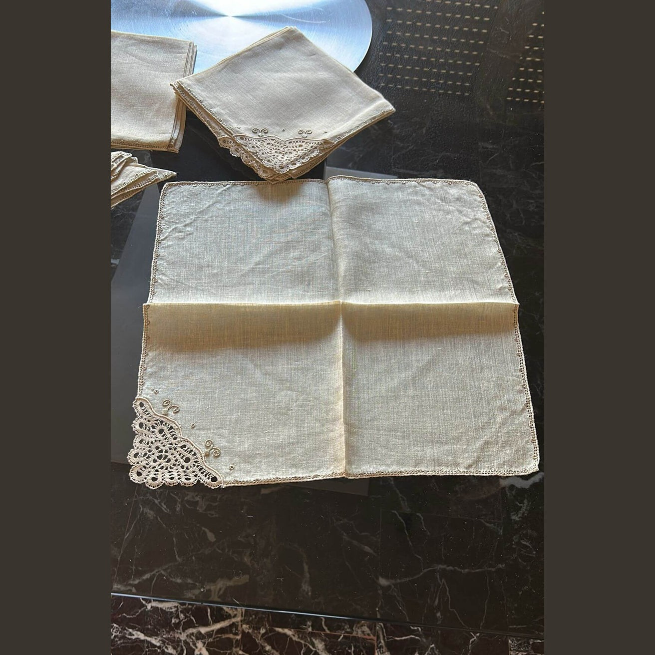 Antique Burano table napkin with lace trim, handcrafted in Italy, perfect for special events or elegant dining.