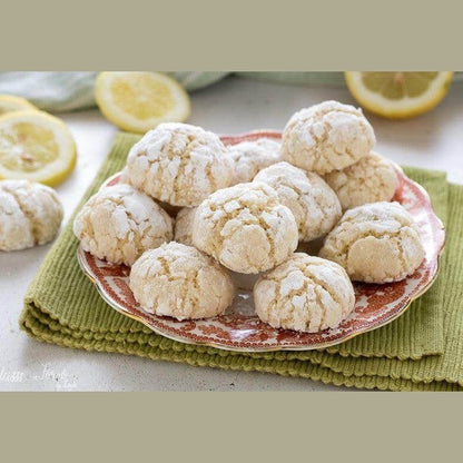 Delicious Bacetti al Bergamotto cookies on a decorative plate, ideal for dessert lovers.