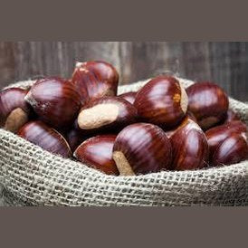 Castagne di Calabria in a burlap sack, energy-rich, gluten-free snack, organic and high in fiber.