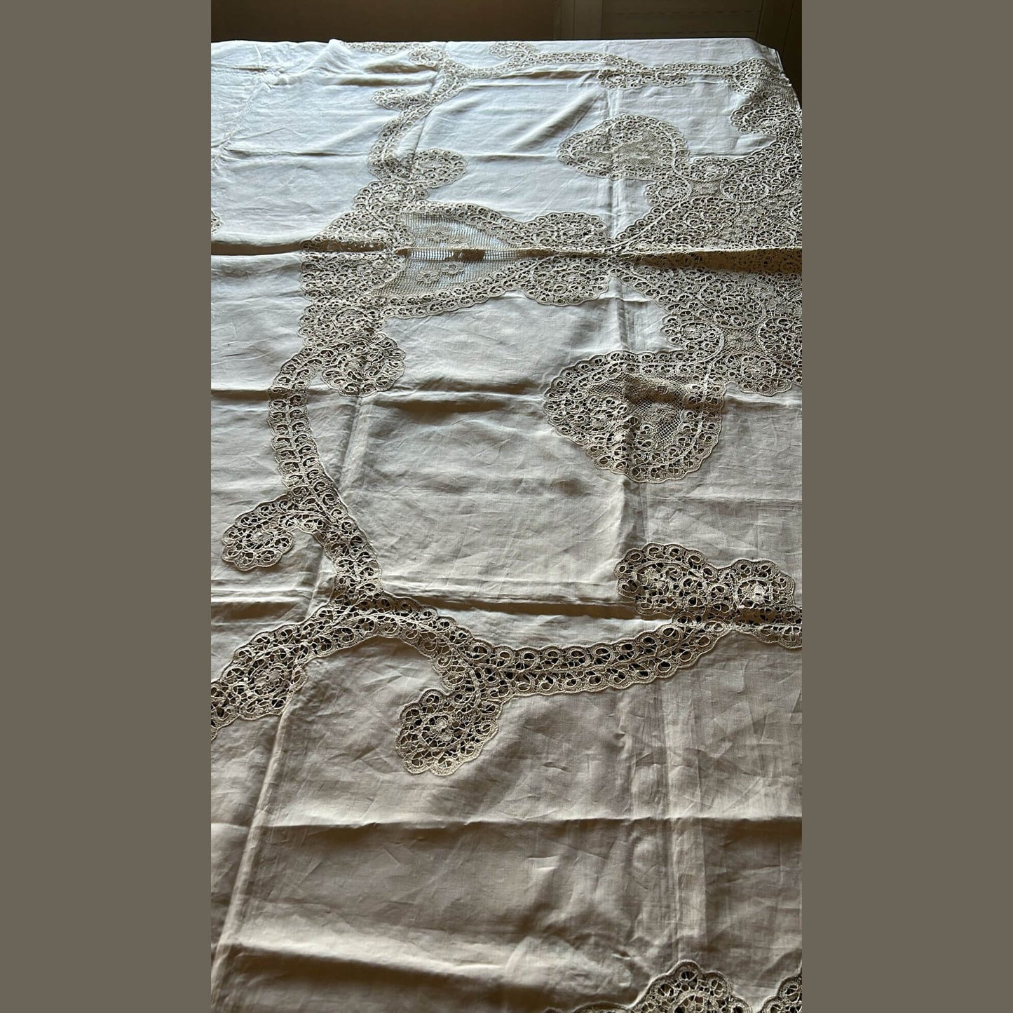 Antique Burano lace linen bedspread showcasing intricate embroidery, original 1950s handmade piece from Italy.