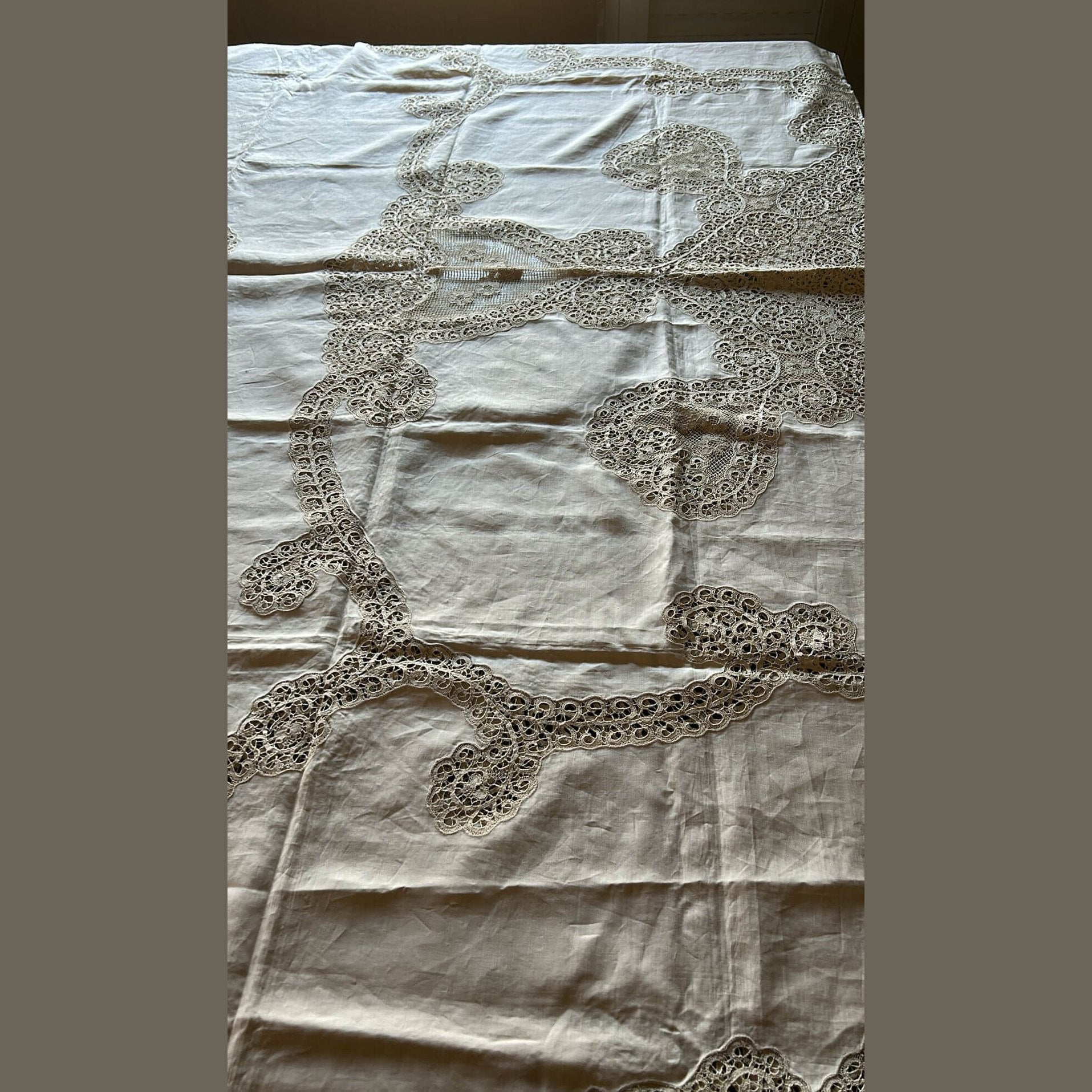 Antique Burano lace linen bedspread showcasing intricate embroidery, original 1950s handmade piece from Italy.