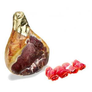 Prosciutto Crudo calabrais, sliced and whole, perfect for antipasti and paired with full-bodied red wine.