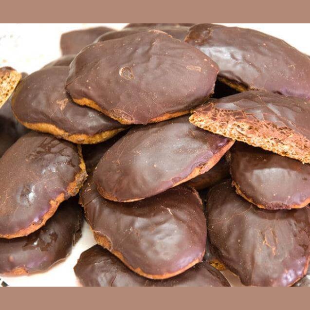 Delicious Susumelle calabresi dolcetti secchi tipici della calabria covered in chocolate glaze.